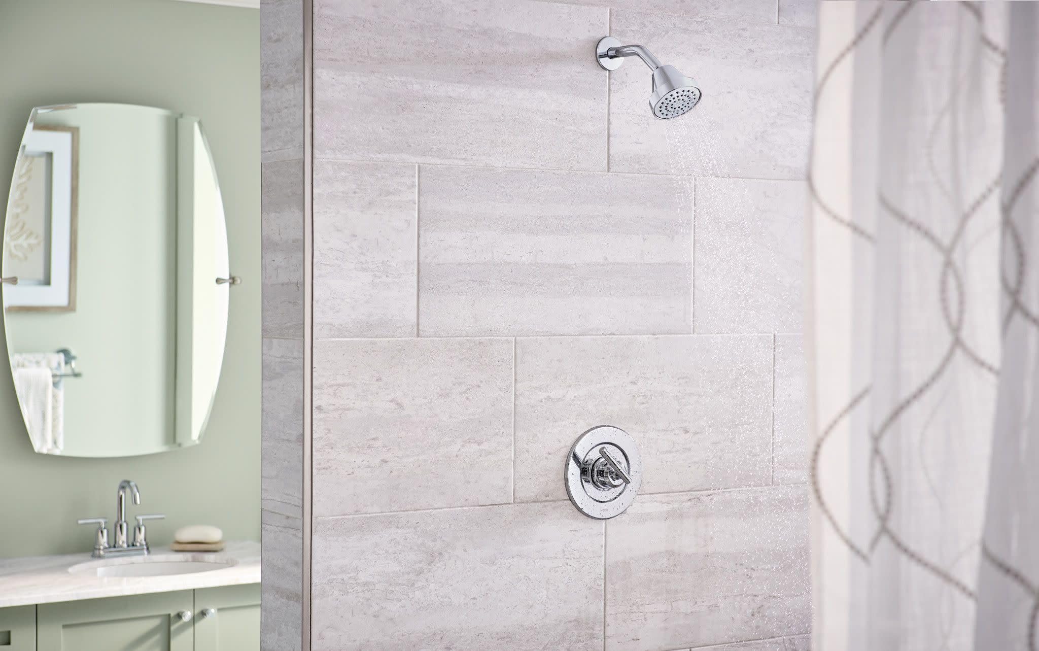 Close-up of Moen Gibson chrome handle showing sleek, contemporary styling