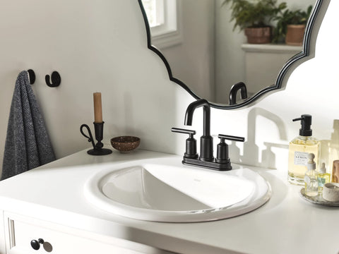 Moen Gibson includes deck plate and drain assembly for a cohesive look.