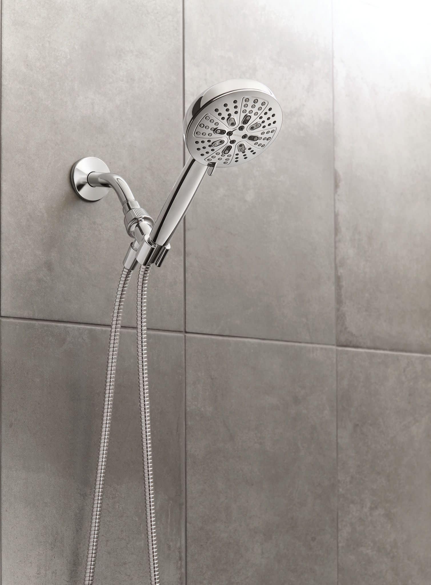 Moen Hydro Energetix handheld shower head for flexible rinsing and reach.