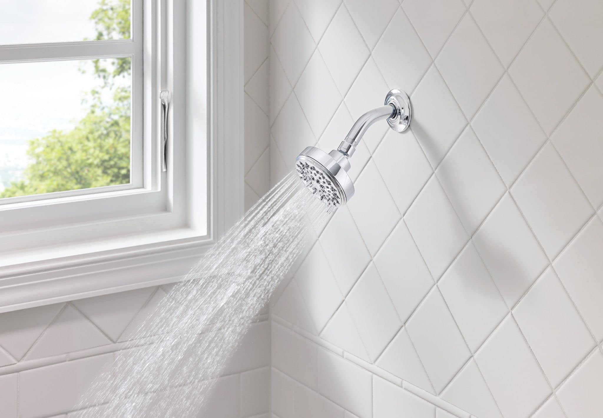 Moen Ignite chrome high-pressure rinse provides thorough cleansing.