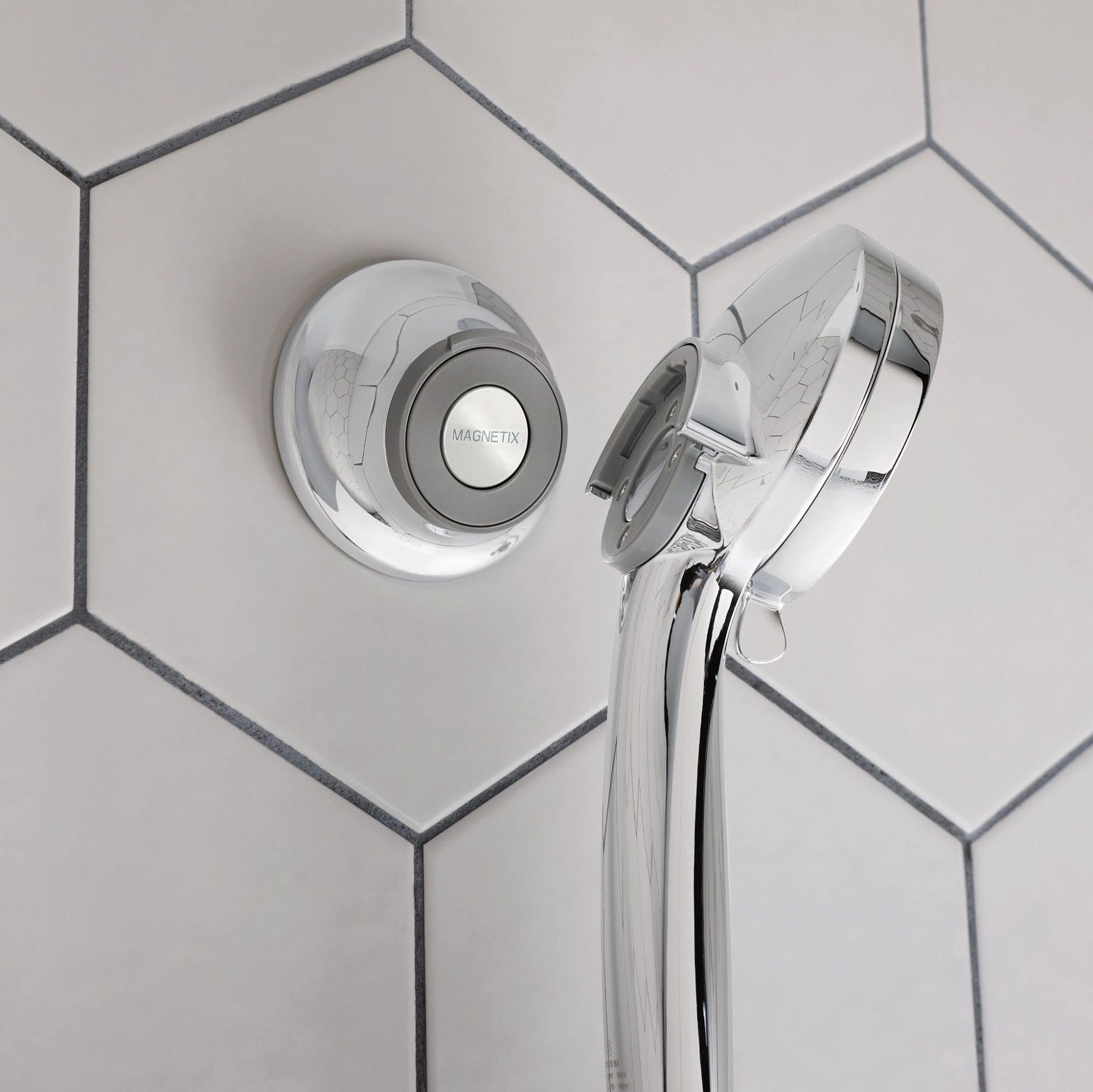 Mounted chrome finish Moen Magnetix remote dock with wall bracket