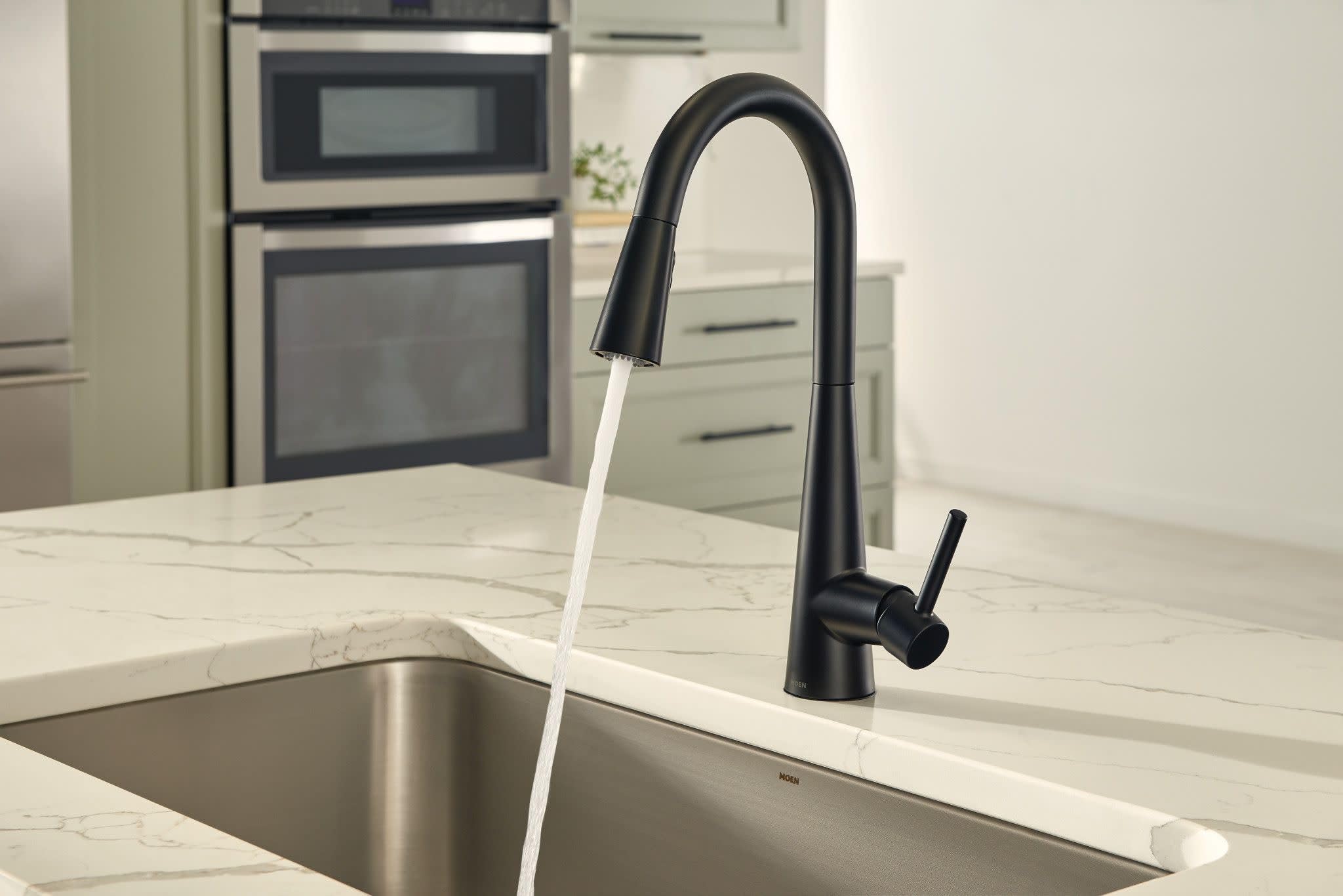 Escutcheon included with Moen Sleek matte black faucet for a seamless look.