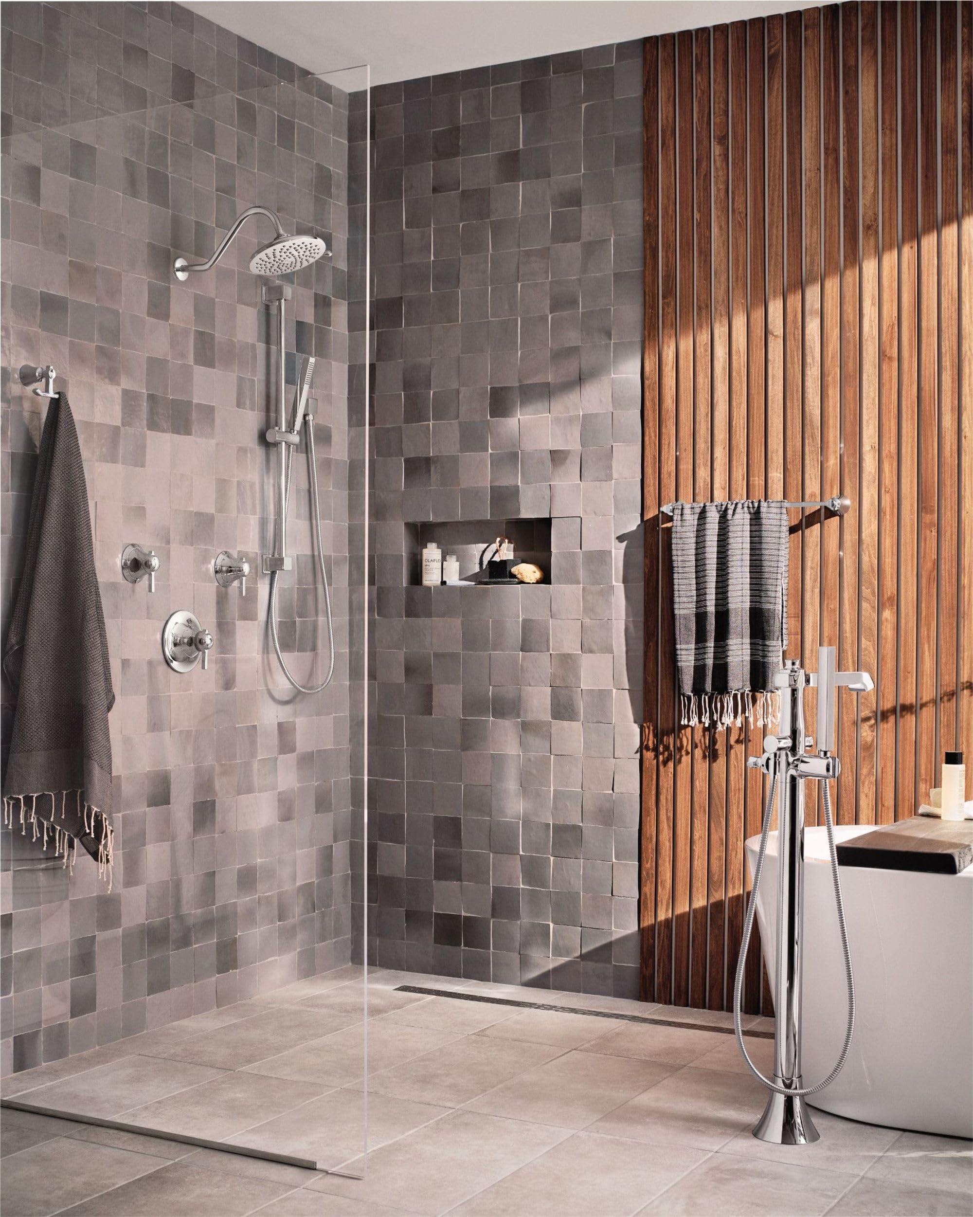 Moen Velocity two-function lever switches between rain and spray modes.
