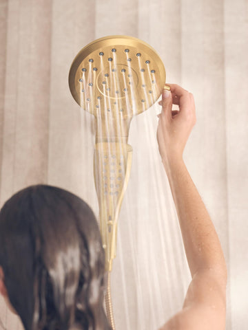 Moen Verso brushed gold 3-in-1 design: rain and handheld operation.