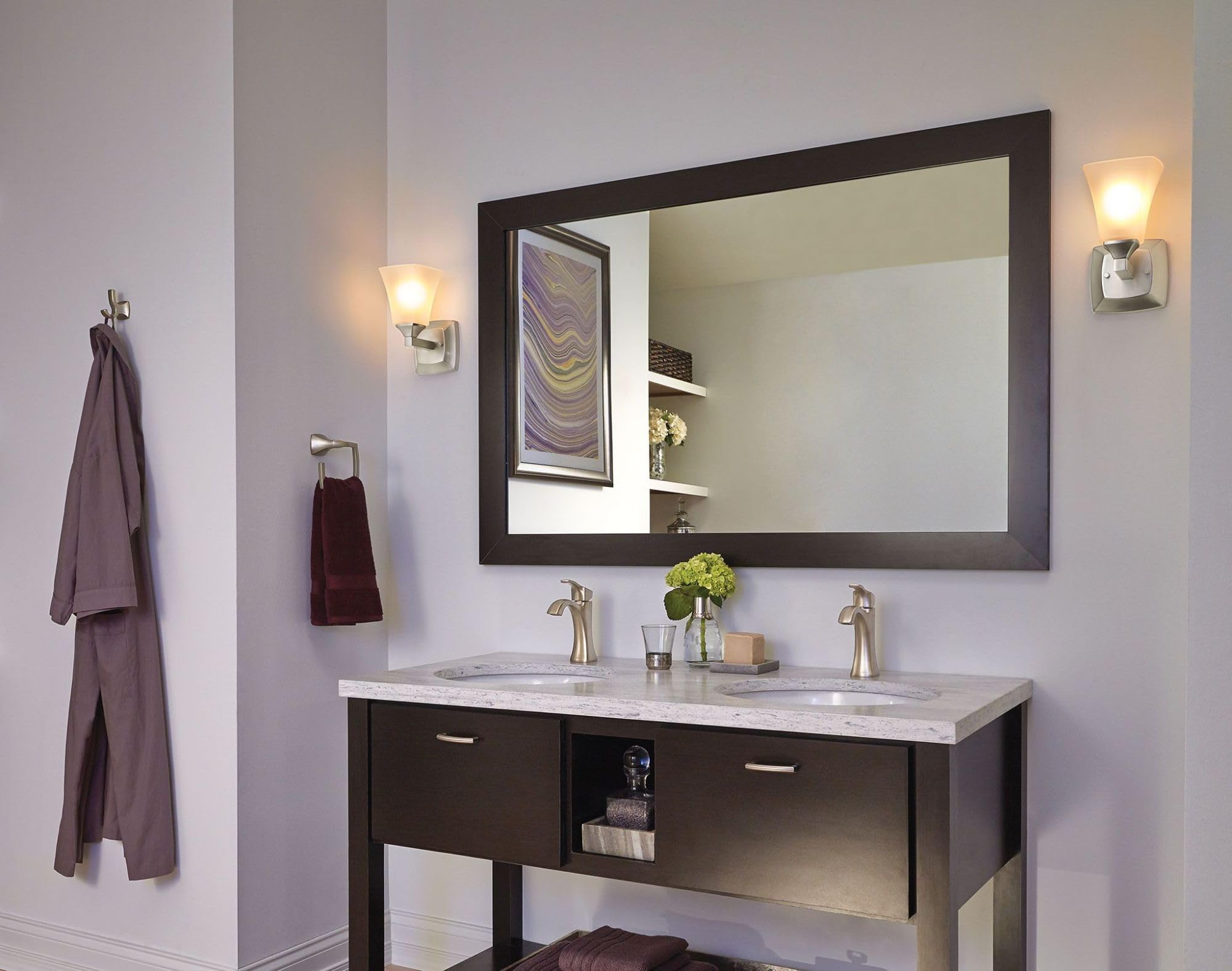 Two-hook design maximizes hanging space in a compact bathroom
