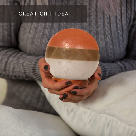MONSALIS lamp with adjustable glow enhances meditation or yoga spaces.