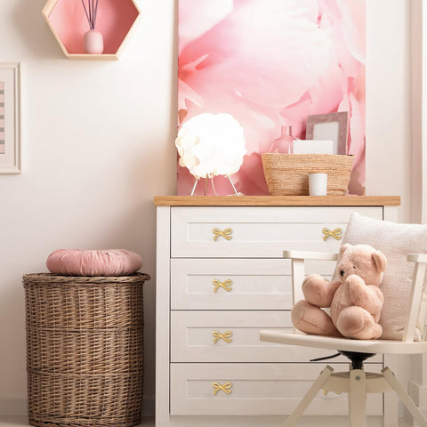 MorningRo vintage bow handle in gold brightens cabinets and elevates room décor.