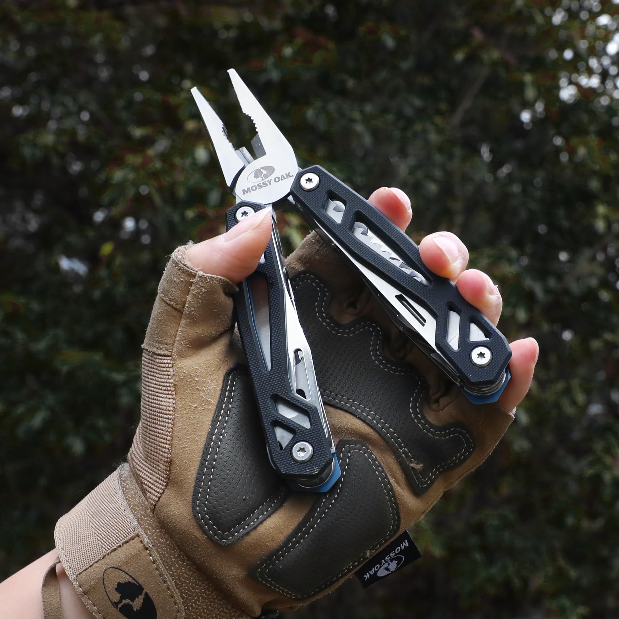 Mossy Oak multitool in outdoor use on a campsite