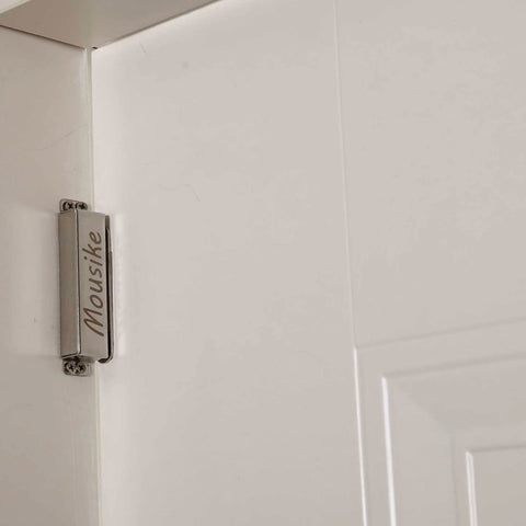 Mousike door catch installed on cabinet and wardrobe doors