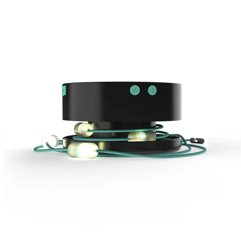 MPOWERD Luci battery pack detaches for charging devices while the string stays mounted.