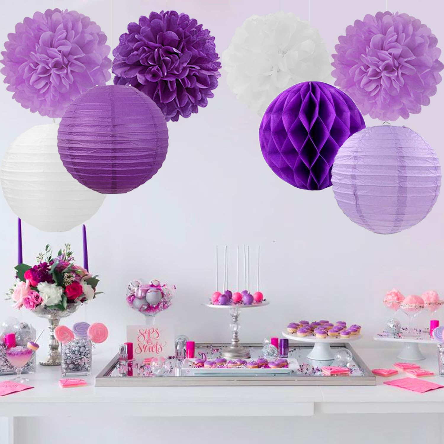 Mprocherify close-up of tissue pom poms in lilac shades
