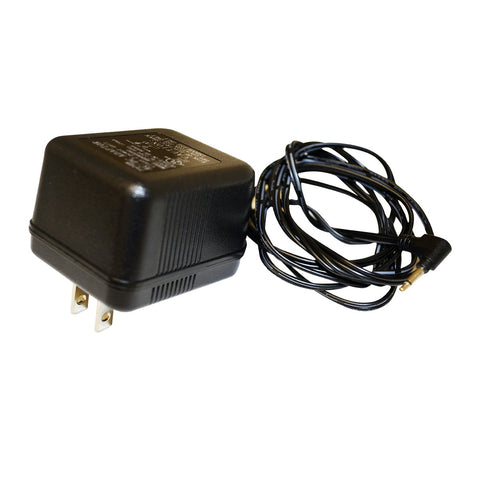 Mr. Heater 6V power adapter in box, ready to replace batteries.