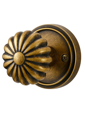 MRML Passage door knob antique brass front view, durable interior hardware for closets.