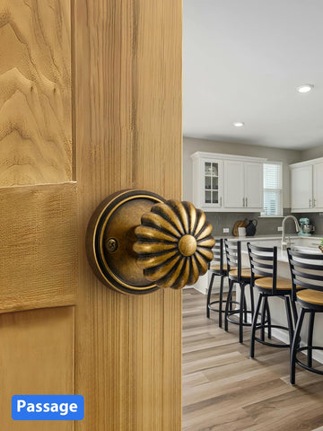MRML Passage door knob antique brass side profile demonstrates universal fit for left or right doors.