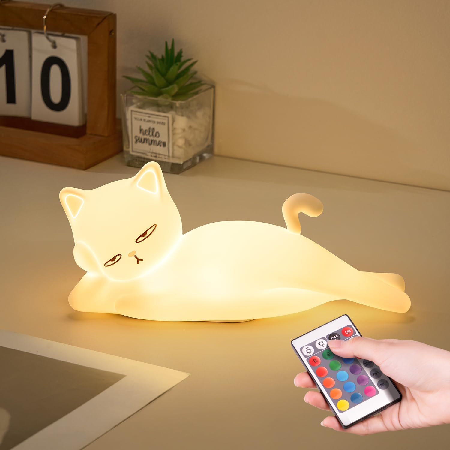 Mubarek lying flat cat lamp provides whimsical mood lighting for kids' rooms.