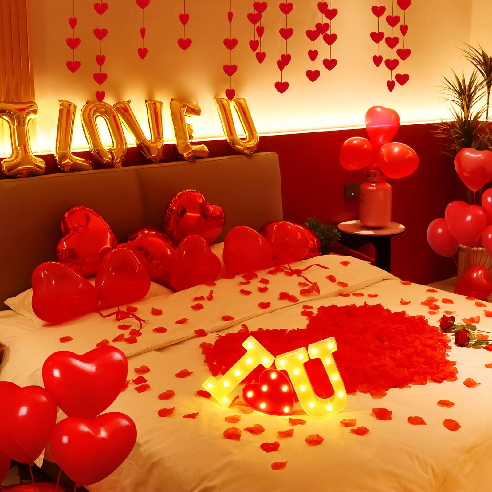 MUDEREK heart-shaped foil balloons create a dreamy ceiling or backdrop