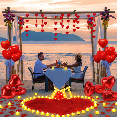 MUDEREK rose petals spread across a table to spark a romantic mood
