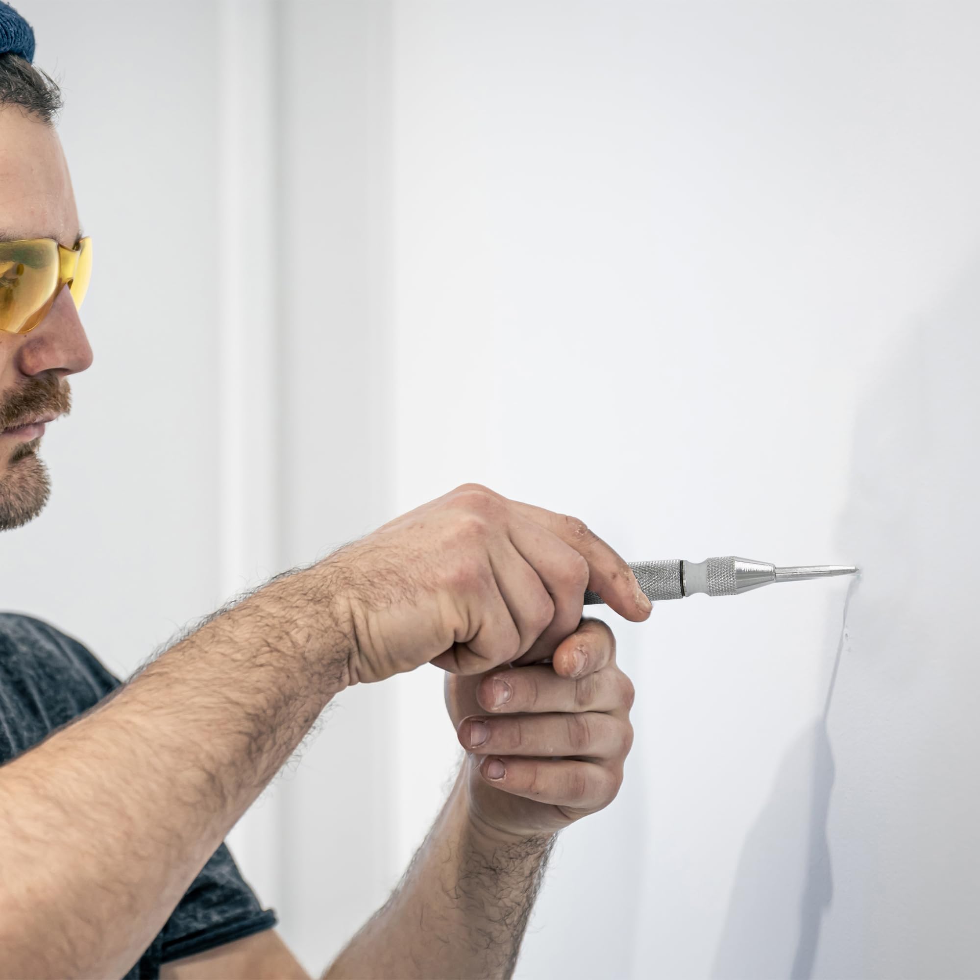 Mulwark center punch marks wood cleanly for precise hole starts