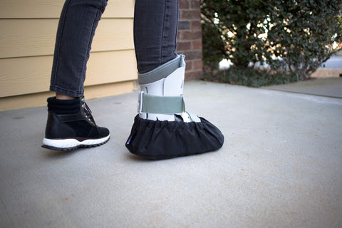 MyShoeCovers reusable washable cover keeps boots and linens clean.