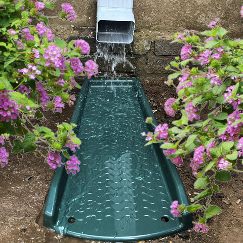 NAACOO downspout splash block shows ladder downward design for efficient drainage.