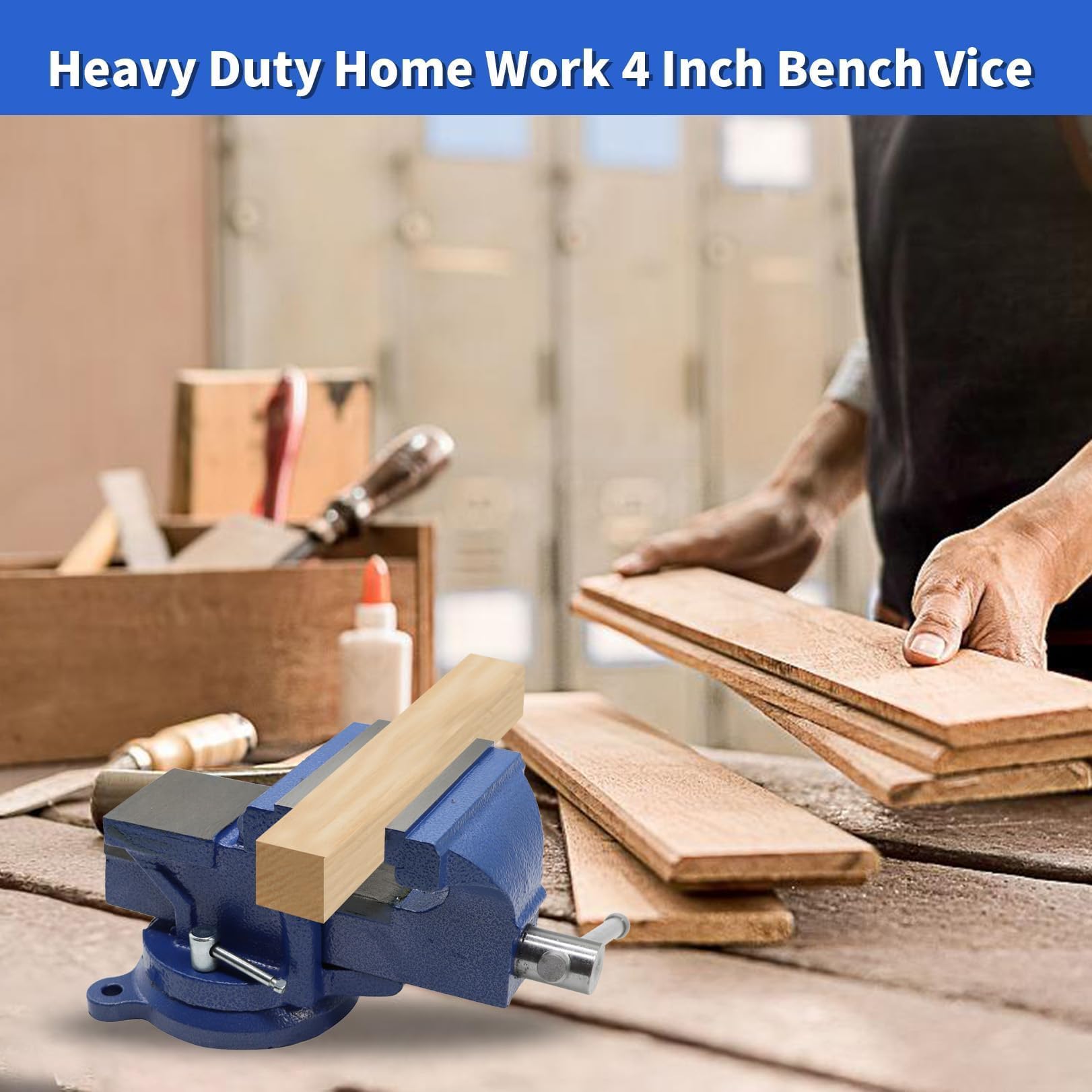 Nakkaa 4-inch bench vise mounted to a workbench in a workshop setup