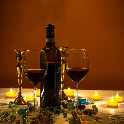 Nancia tea lights in use create a warm glow on the table.