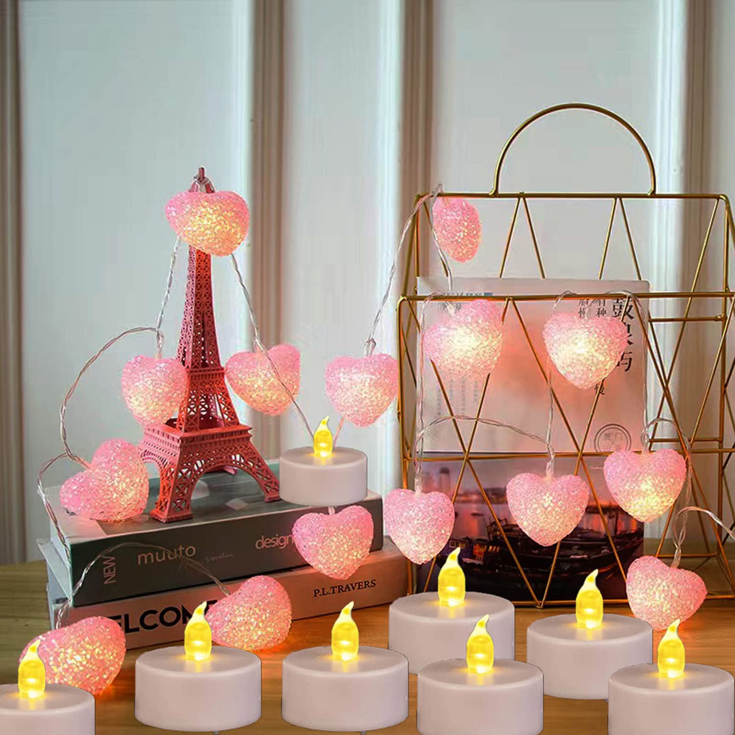 Nancia tea lights in votive holders offer flickering candlelight.