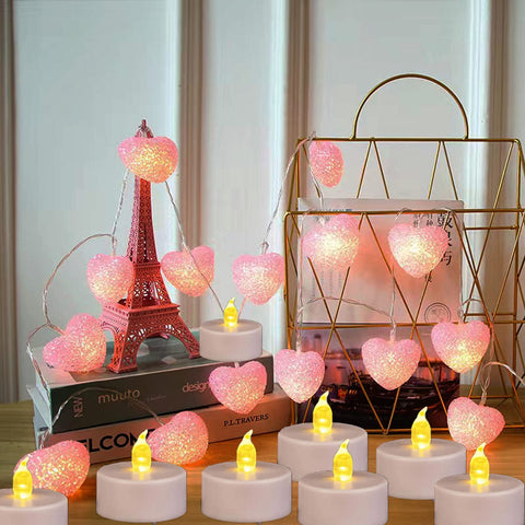 Nancia tea lights in votive holders offer flickering candlelight.