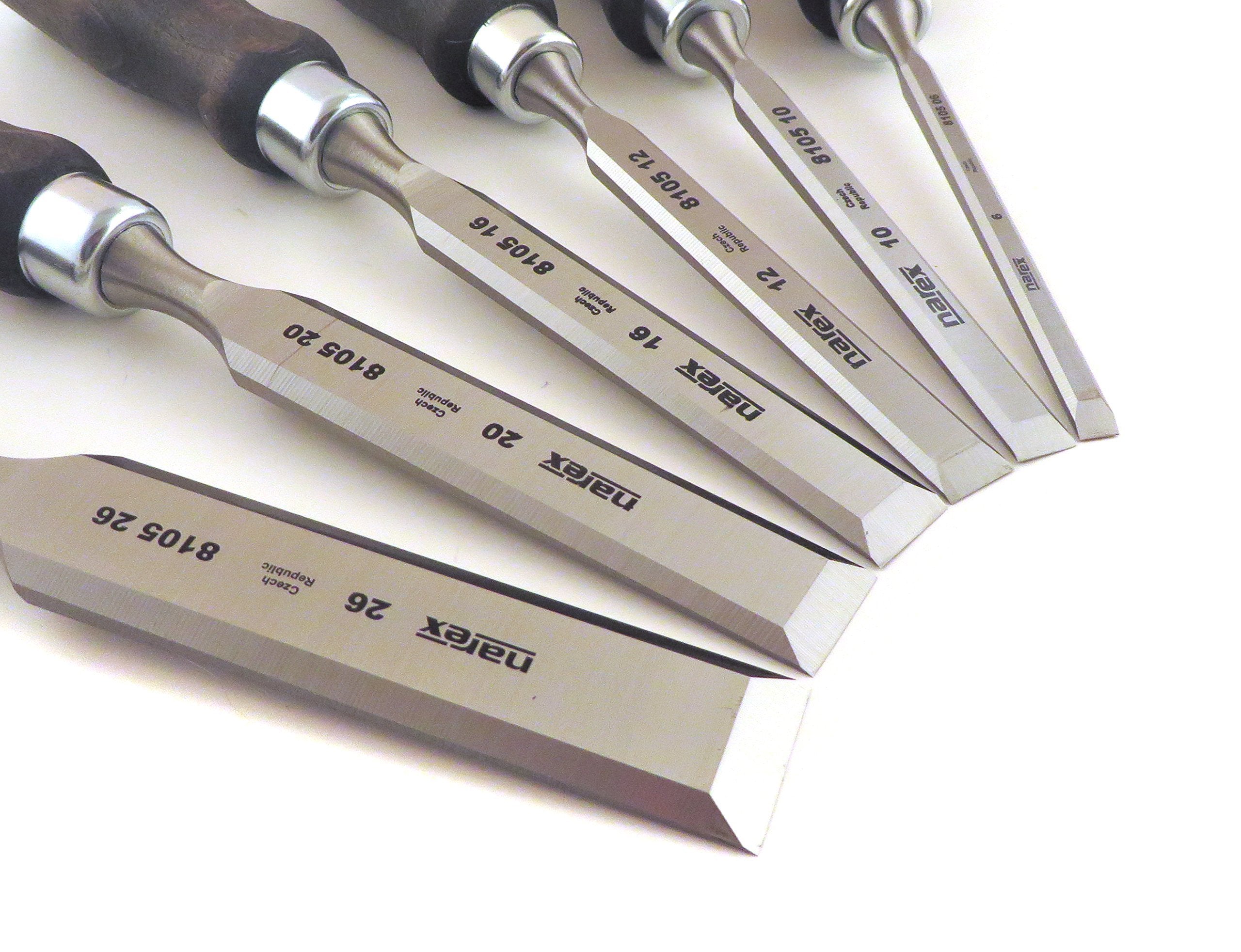 Narex chisels arranged in wooden presentation box for organized workshop use.
