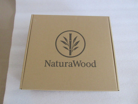 NaturaWood multi-roll storage holds spare toilet paper for quick refreshes.