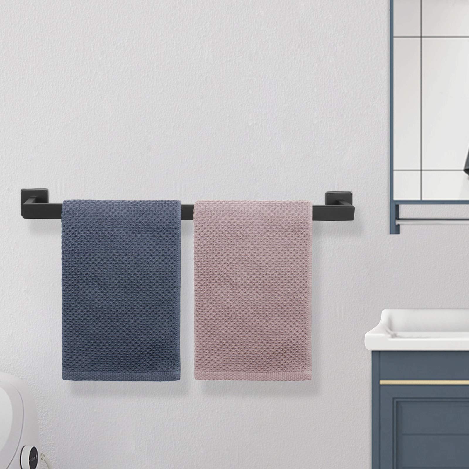 NearMoon wall-mounted rack supports up to 22 pounds for towels.