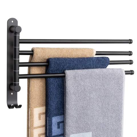 NearMoon four-arm swivel towel rack on wall with space-saving design.