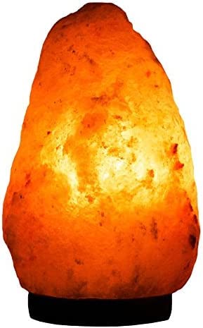 Needs&Gifts hand-carved pink salt lamp showcases unique texture and craftsmanship.