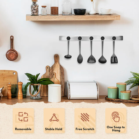 Neosmuk magnetic hook in gold finish adding stylish organization to a space.