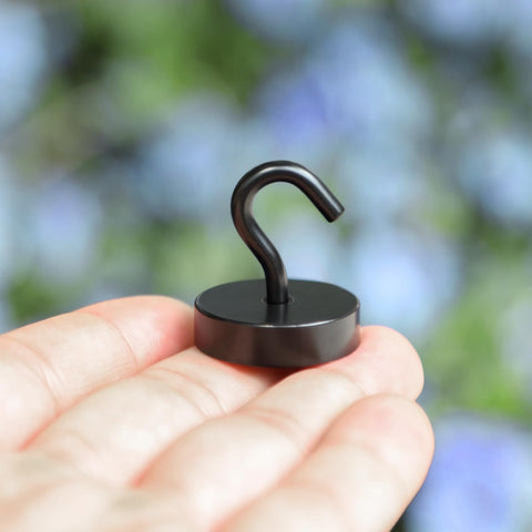 Neosmuk magnetic hook on refrigerator door demonstrating heavy-duty mounting for utensils.