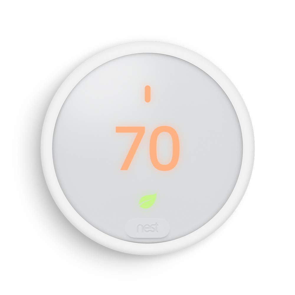 Nest Thermostat E front view in frosted white blending with walls.