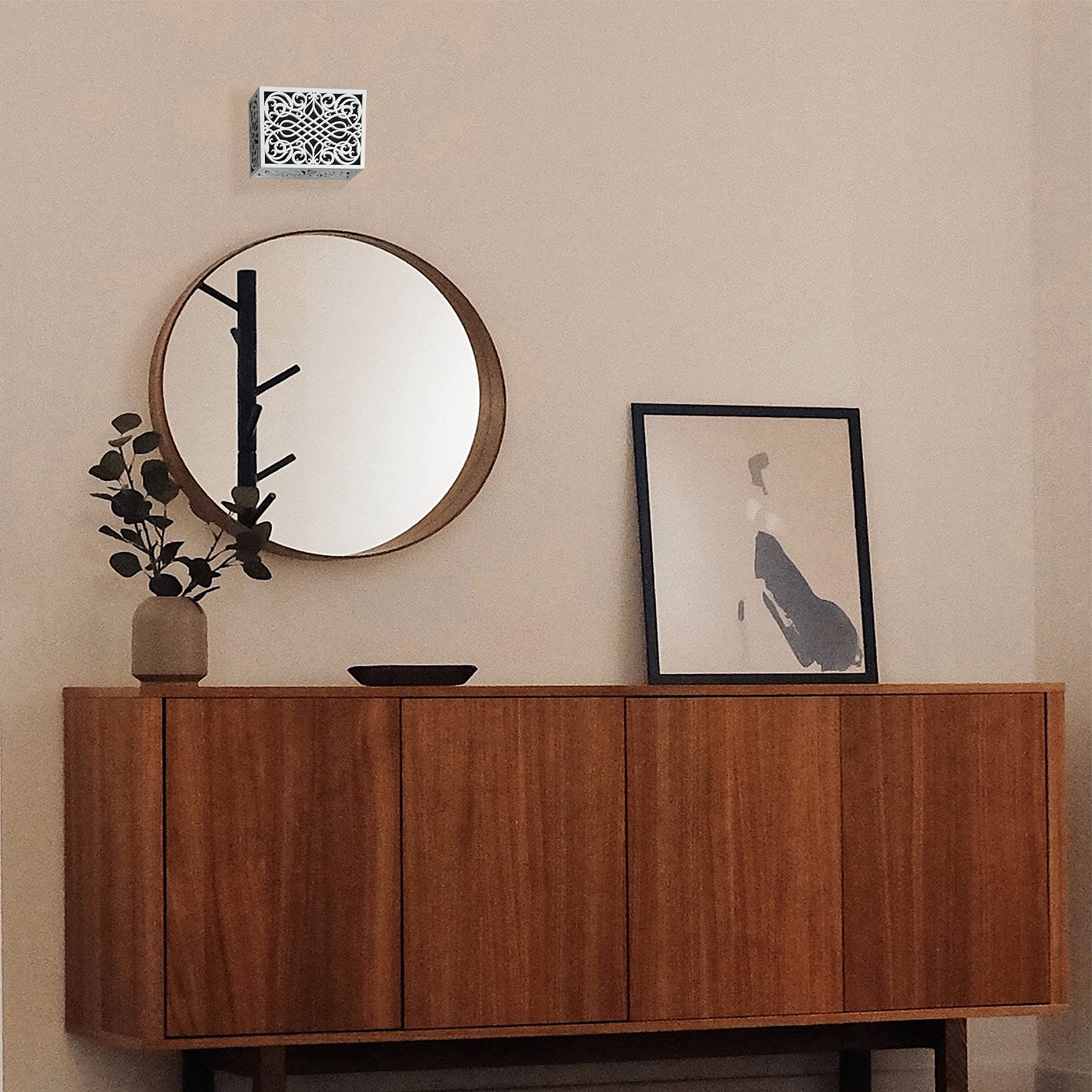 Newhouse Corinthian cover hides the chime behind black cloth interior.