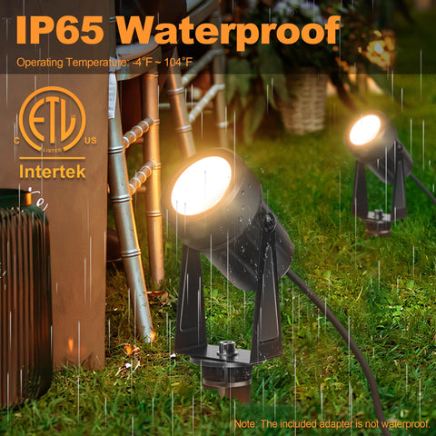 NEWKAZ LED spot light 18W 3000K highlights trees and pathways with a warm glow.