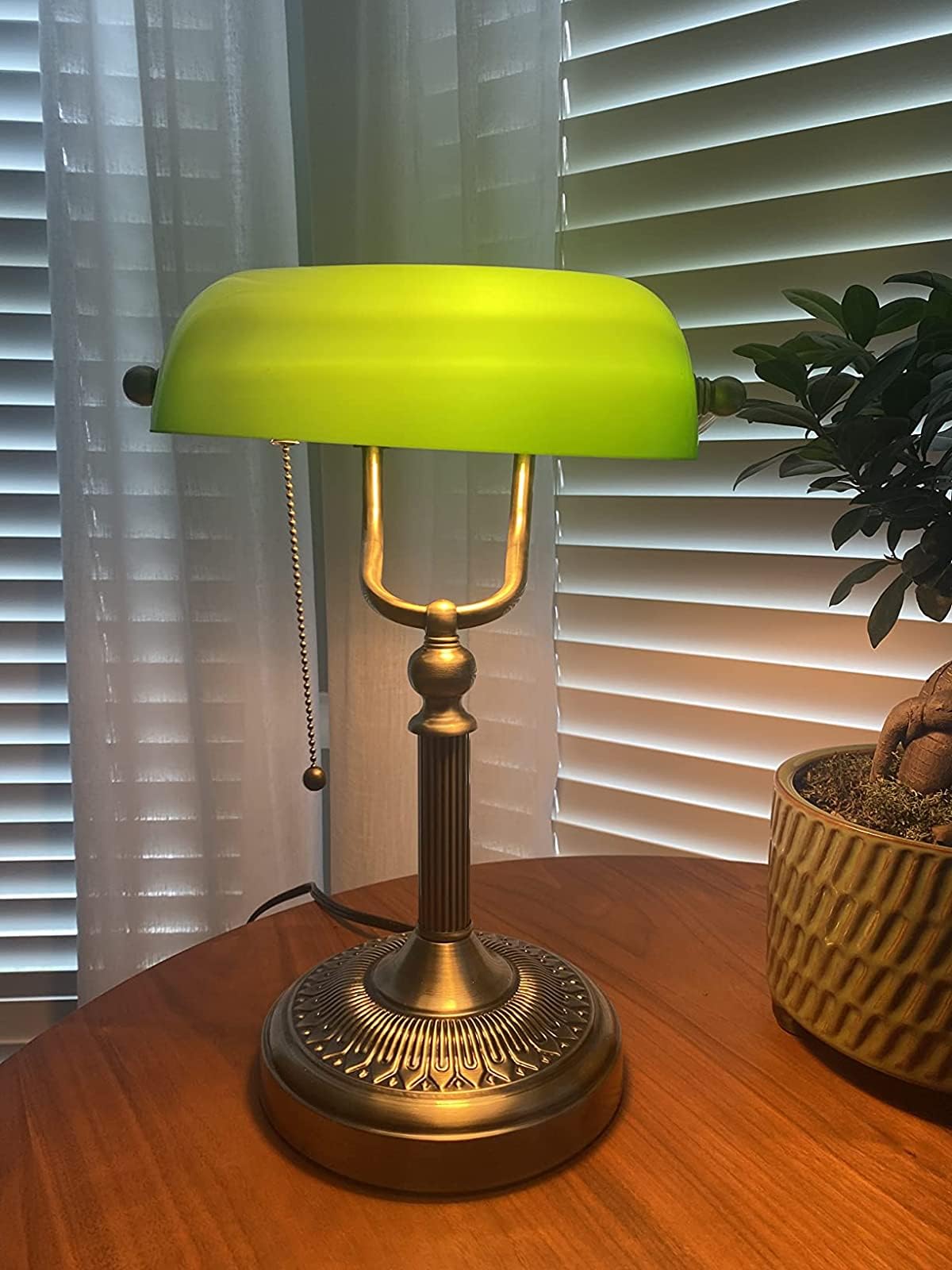 Newrays green glass bankers lamp packaging keeps items safe.