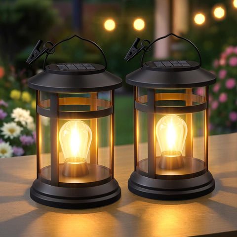 NFEVER solar lanterns hanging in backyard offering warm ambient light.