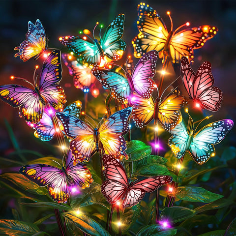 NFEVER solar butterfly lights 2-pack illuminate the garden with colorful butterflies at night.
