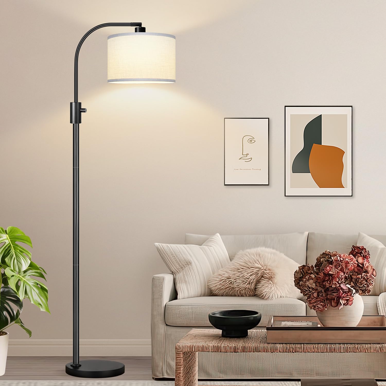 Nintiue arc lamp in black base shown in a modern living room setup