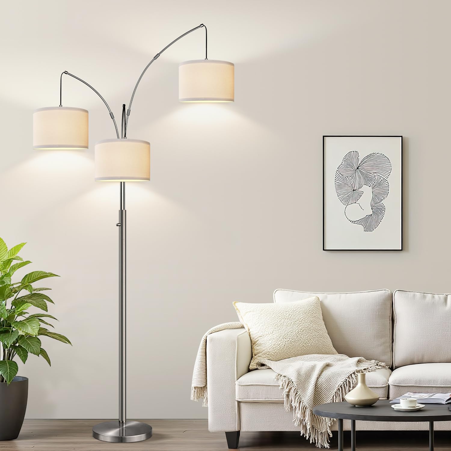 Nintiue dimmable arc floor lamp with three lights in brushed nickel for versatile living room lighting.