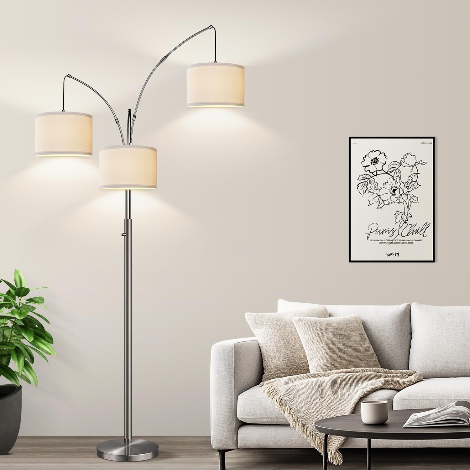 Nintiue dimmable floor lamp with arc of three arms lighting a living room corner