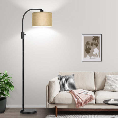 Nintiue tall lamp in living room with warm ambience.