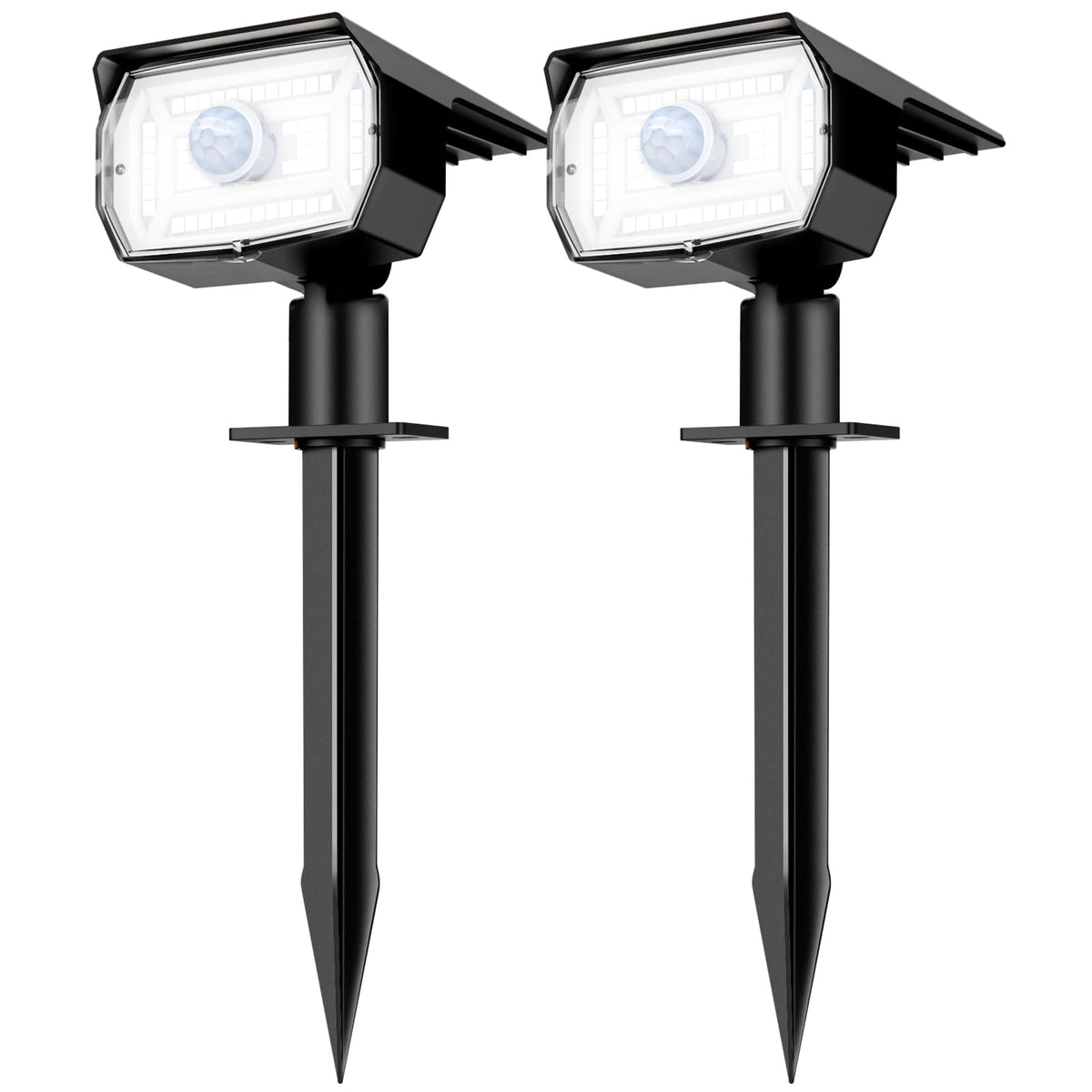 Nipify solar spot light glowing at night to warmly illuminate outdoor spaces