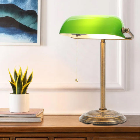 NISSAFORS bankers lamp with green glass shade for focused desk lighting.