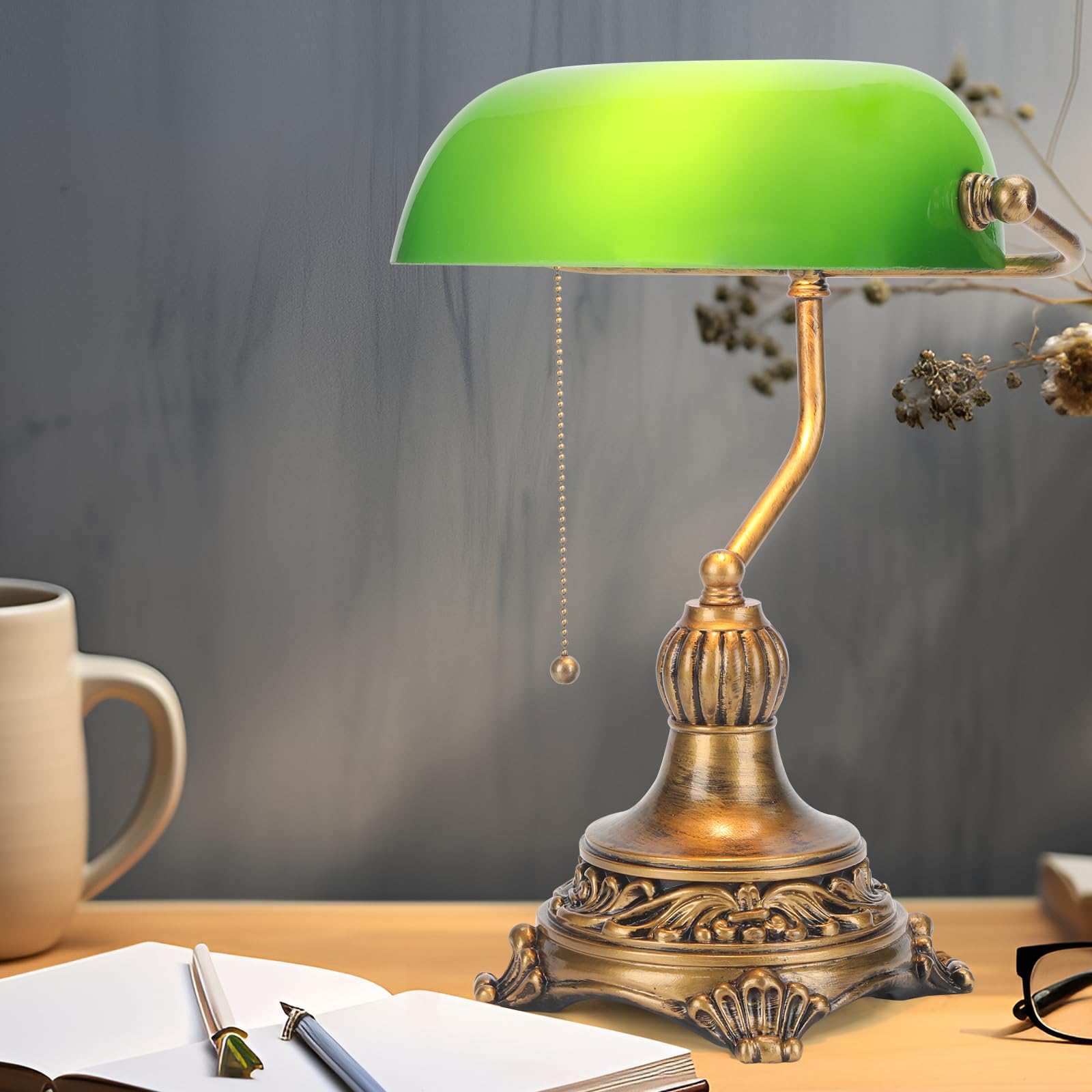 NISSAFORS bankers lamp with green glass shade, perfect for focused desk lighting.