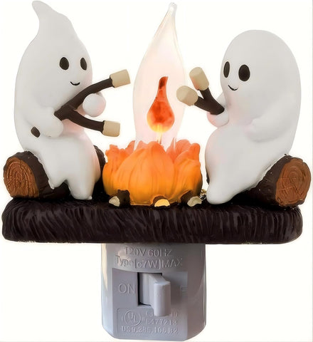 nlaa Ghost Campfire Nightlight features two friendly ghosts roasting marshmallows for cozy Halloween ambience.