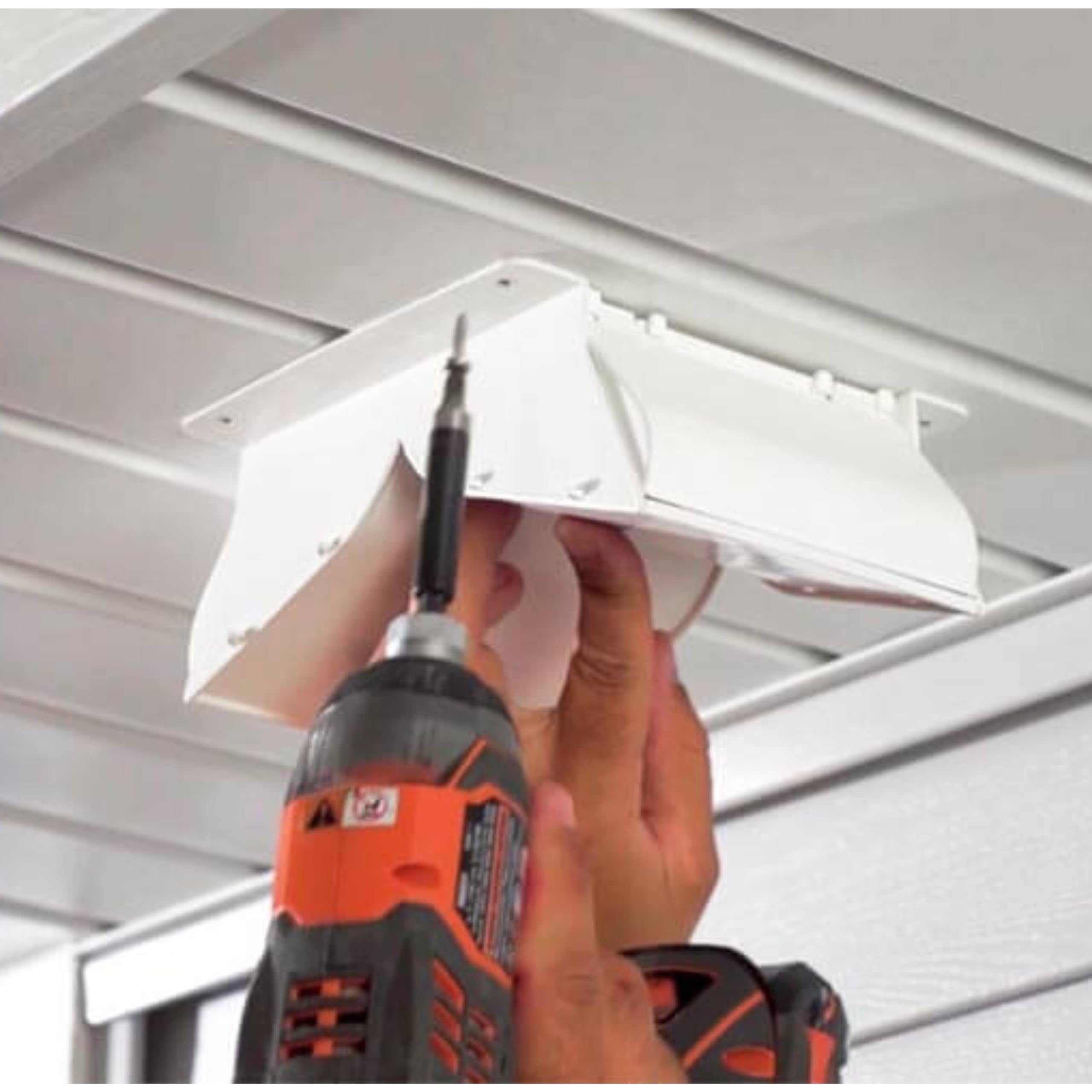 Bathroom exhaust installation using No-Pest Vent for controlled airflow.